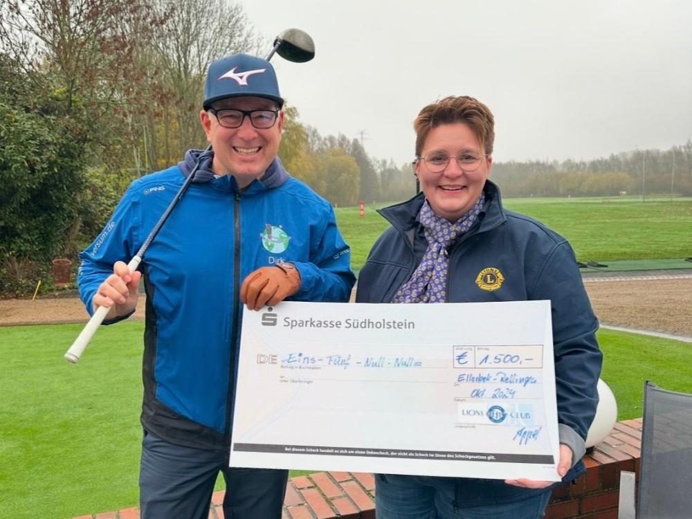 Dirk Beyer und Nicole Appel mit dem Spenden-Scheck